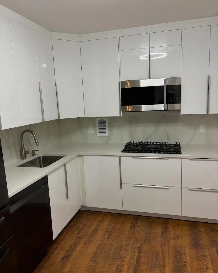 Restored kitchen with white cabinets after water damage in Westfield
